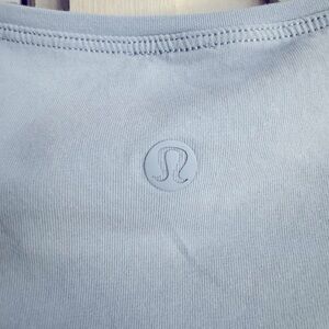 Lululemon back in action dress size 8. Light Blue
